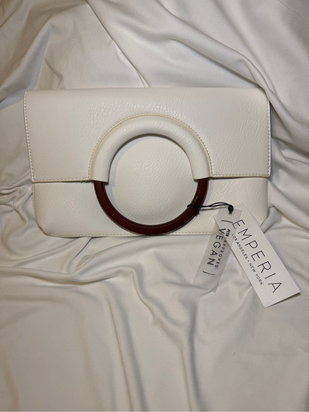 Emperia White Vegan Leather Clutch with Brown Circular Handle